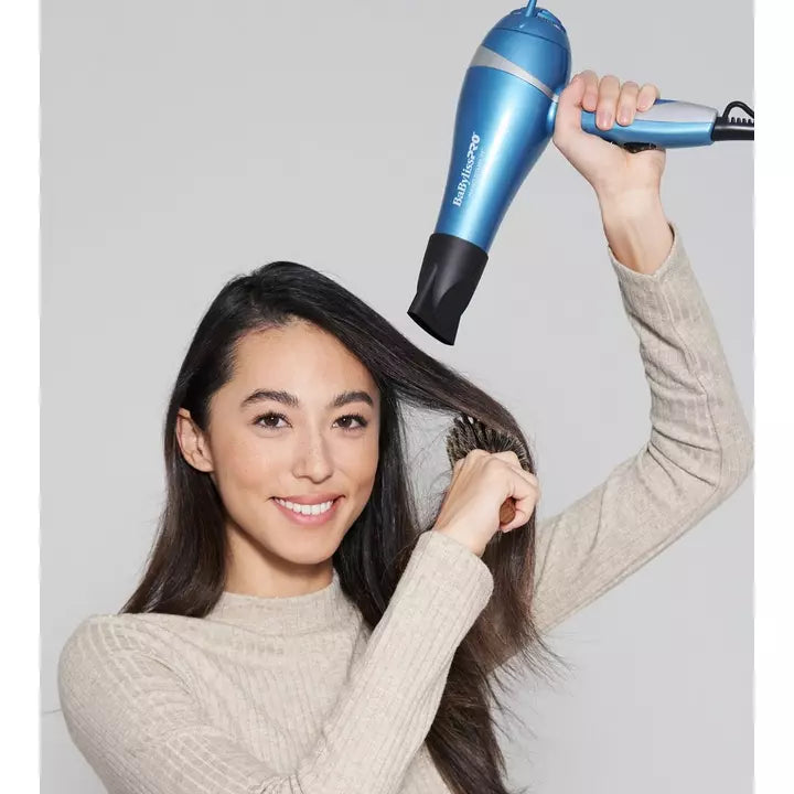 Model using BaByliss Pro Nano Titanium Dryer