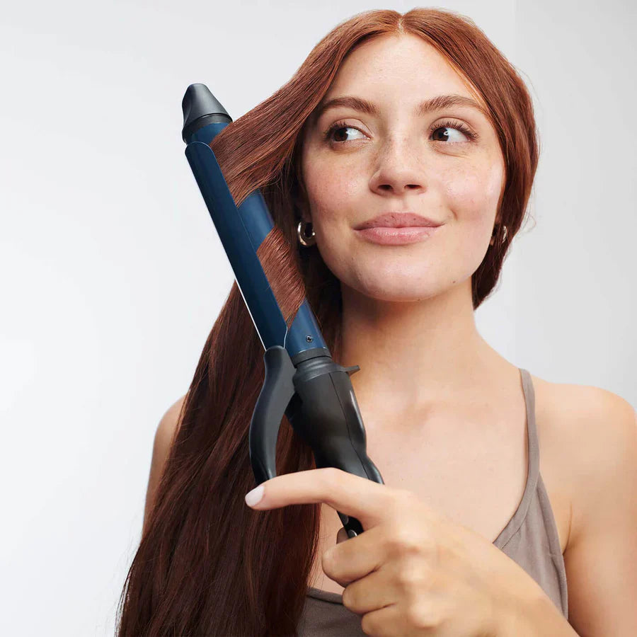 Model using Bio Ionic Graphene MX Long Barrel Curling Iron 1.25”