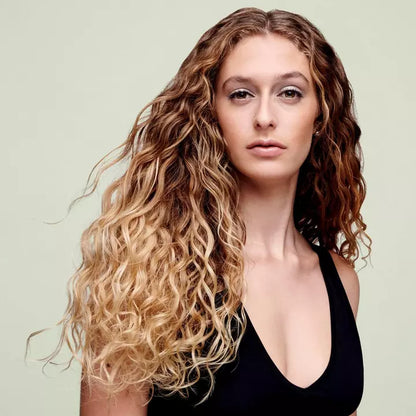 Model before and after use of Deva Curl No-Poo Original - Zero Lather Cleanser for Rich Moisture 