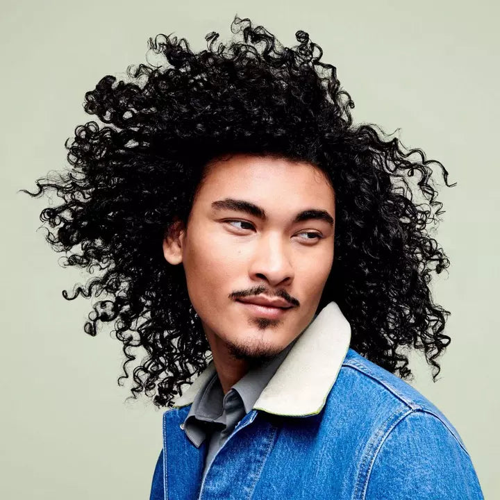 Model before and after use of Deva Curl One Condition Decadence - Ultra-Rich Cream Conditioner 