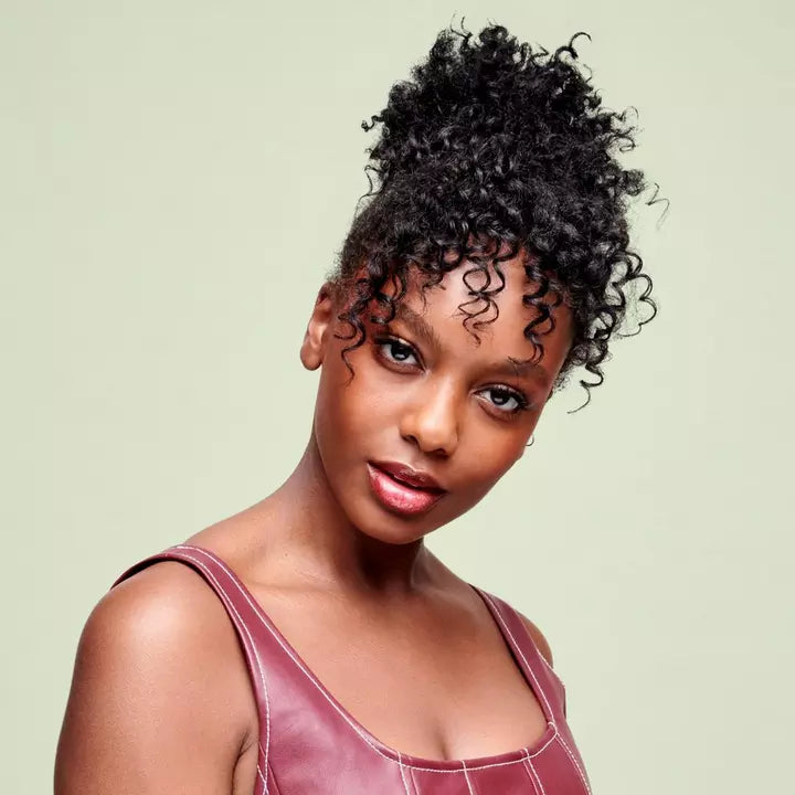 Deva Curl Model using Styling Cream - Touchable Moisturizing Definer