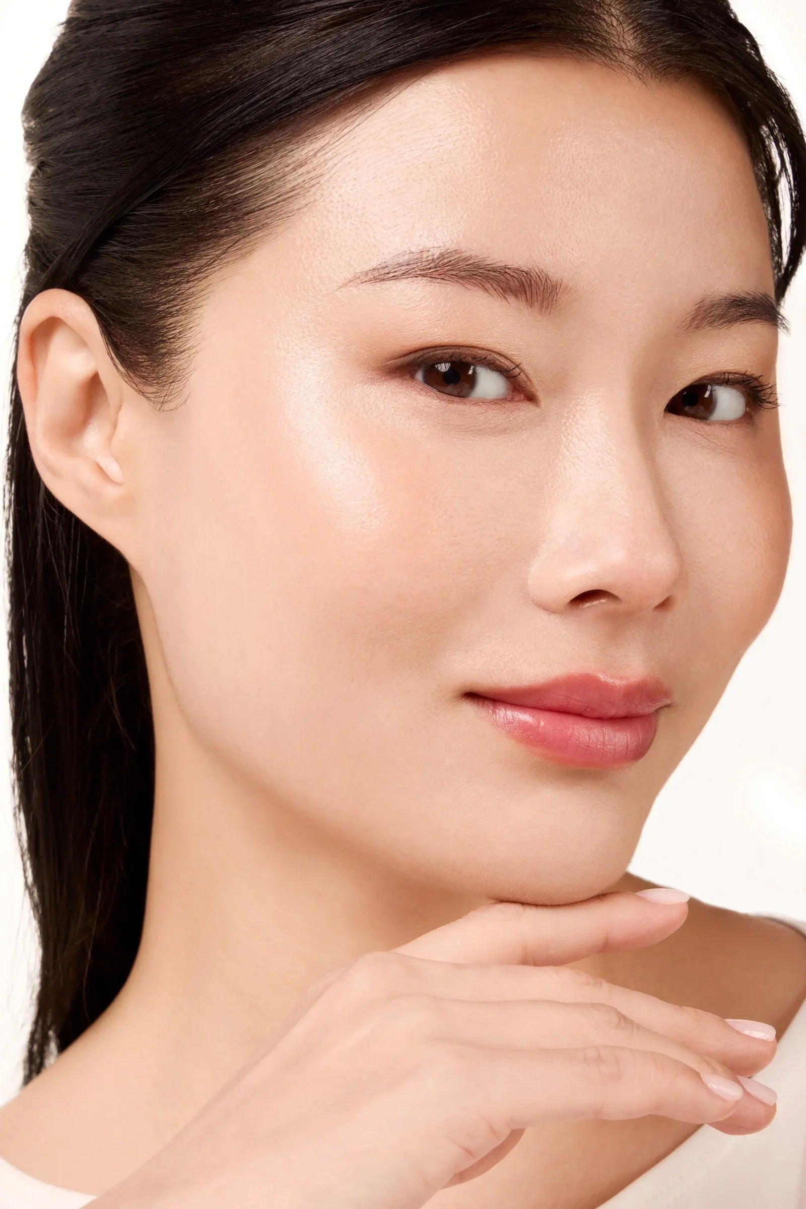 Model wearing Light - Mavala Perfect Liquid Concealer