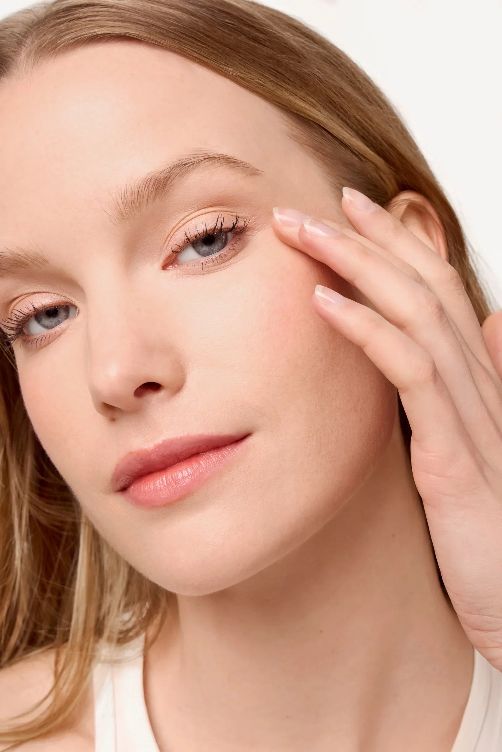 Model wearing Medium - Mavala Perfect Liquid Concealer