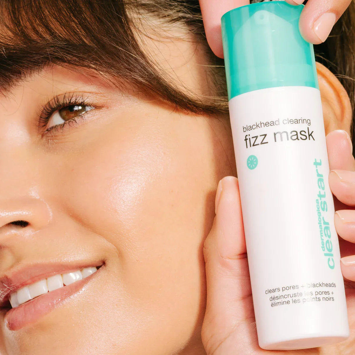 Model holding Dermalogica Clear Start Blackhead Clearing Fizz Mask 